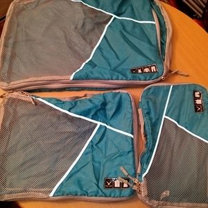 Teal travel compression packing cubes